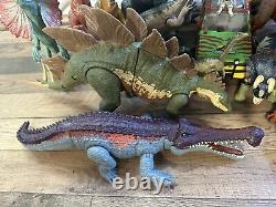 Jurassic World Figure Lot Indominus Carnotaurus TRex Sarcosuchus Stegasaurus