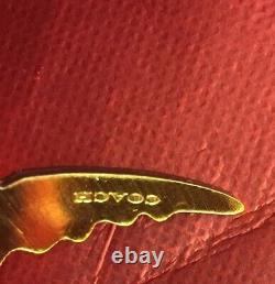 NEW NWT Coach Rexy T-rex Bag Charm Keychain Dinosaur Metallic Yellow Gold Puzzle